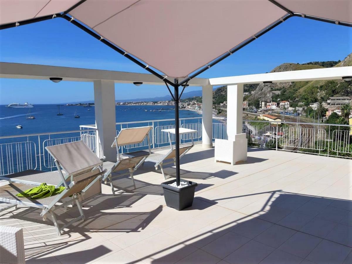 Baia di Atlantide Apartment Taormina Bagian luar foto