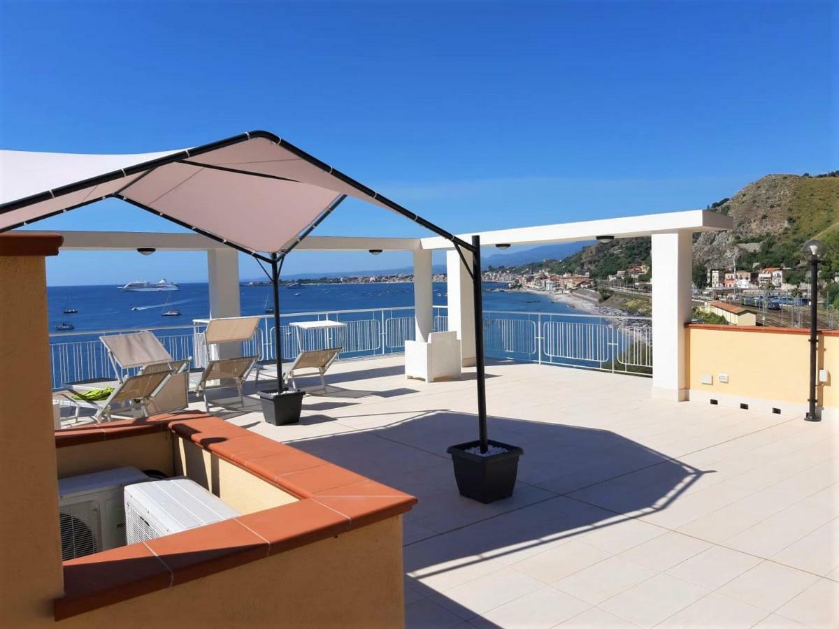 Baia di Atlantide Apartment Taormina Bagian luar foto